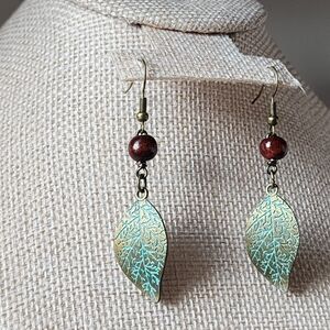 Elegant Brass Leaf Design Earrings with Red Beads